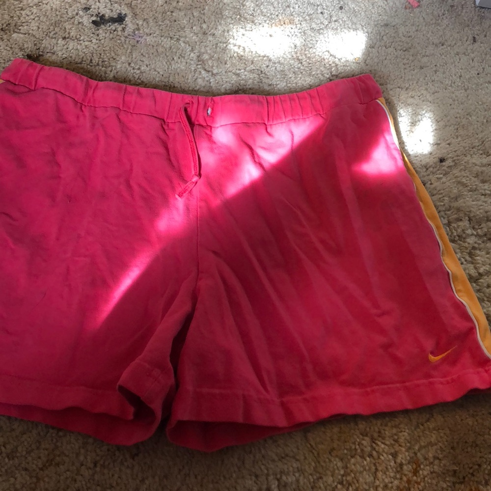 Pink and orange Nike shorts